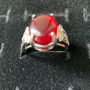 Gemstone ring silver plated very beautiful fit size 7 and can make bigger .